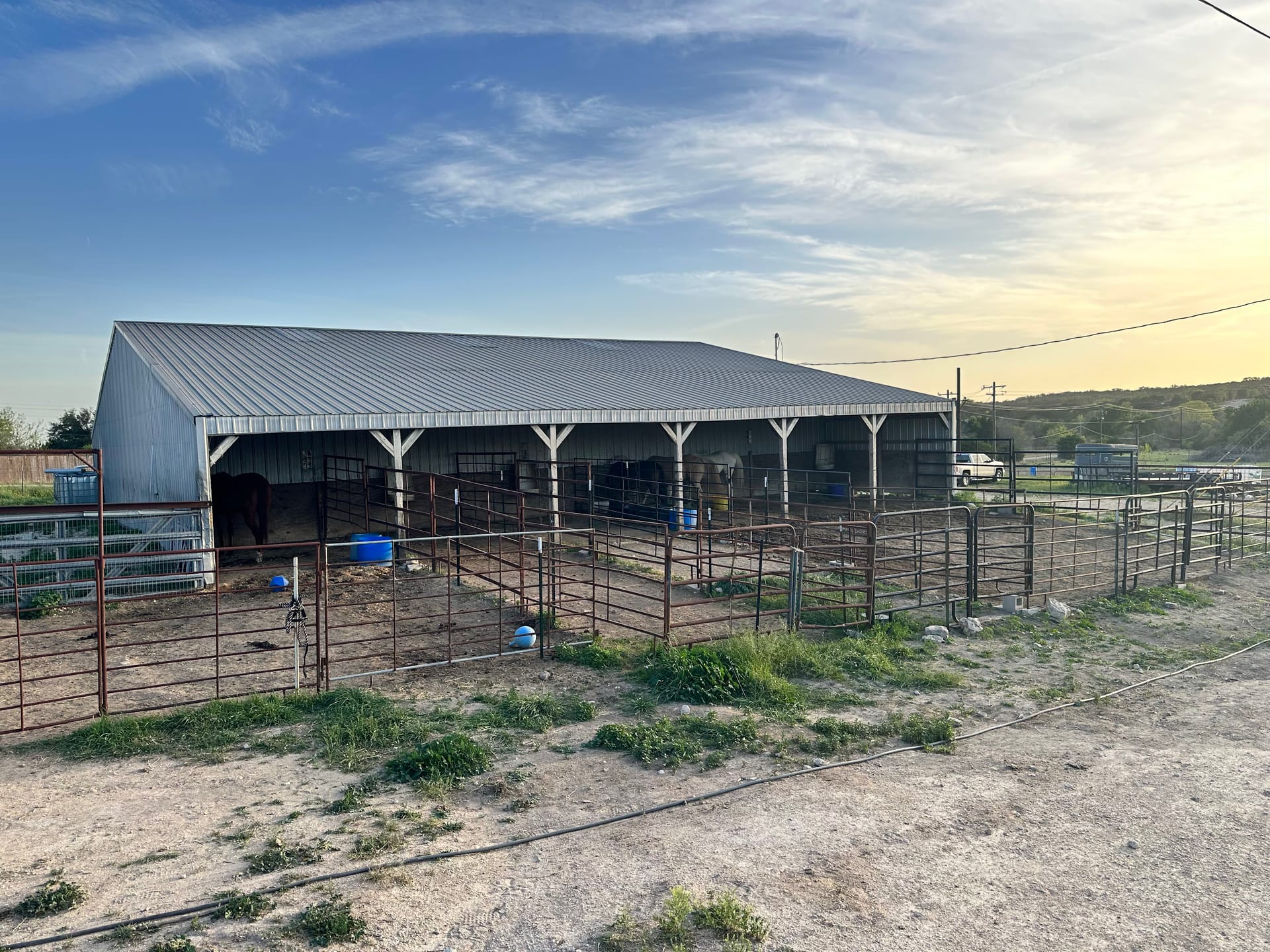 Clean horse barn with well-ventilated stalls at JB Boarding